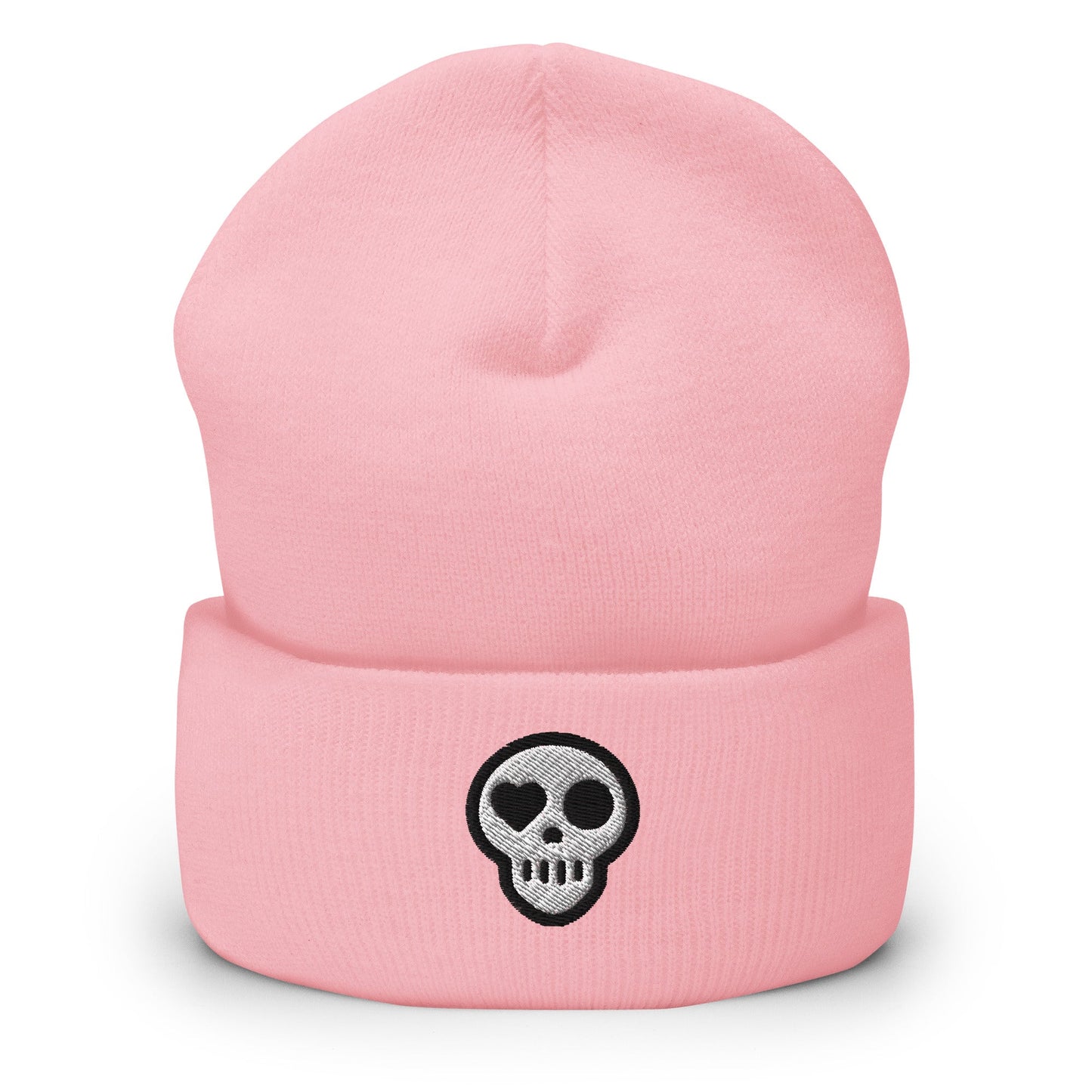 A Baby Pink hats_hearth beanie from Phobea with a heart eye skull logo