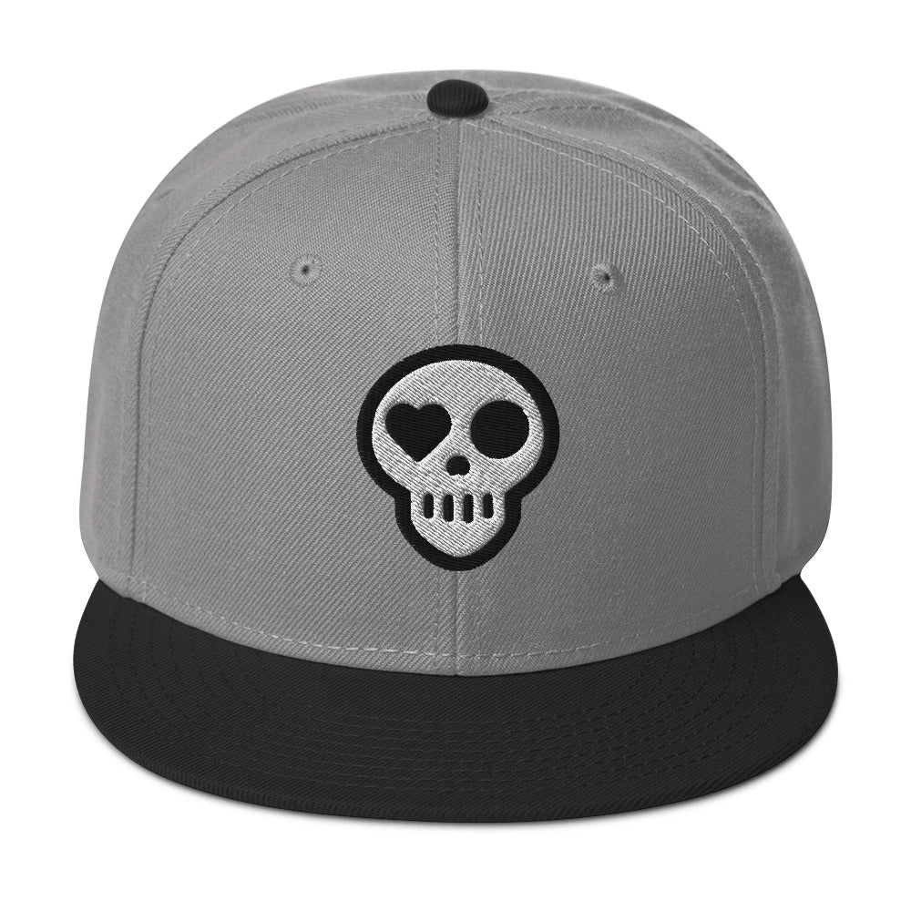 A Black / Gray / Gray hats_ghost snap from Phobea with a heart eye skull logo