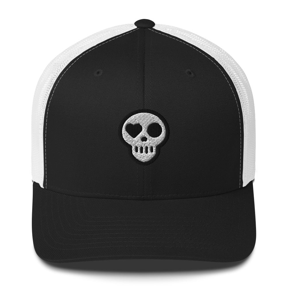 A Black/ White Hats - Nomad Trucker from Phobea with a heart eye skull logo