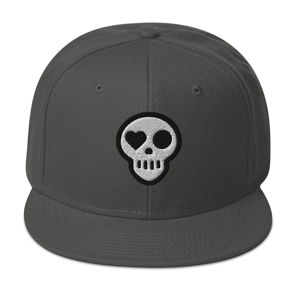 A Charcoal gray hats_ghost snap from Phobea with a heart eye skull logo