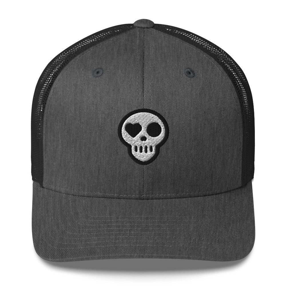 A Dark Heather Gray Hats - Nomad Trucker from Phobea with a heart eye skull logo