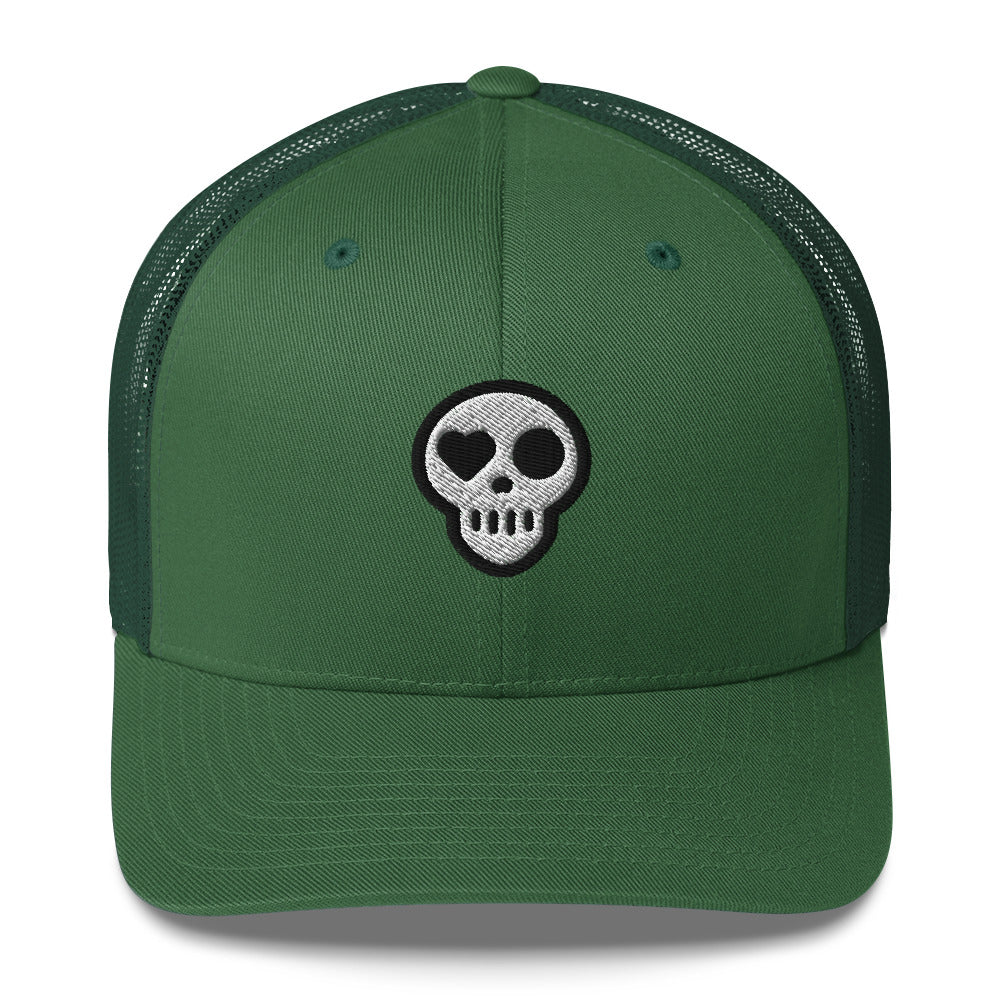 A Evergreen Hats - Nomad Trucker from Phobea with a heart eye skull logo