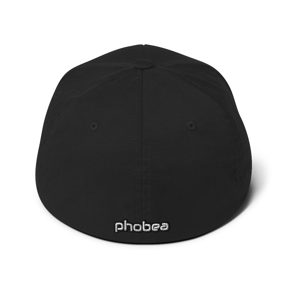 A hats_fitted eclipse cap from Phobea with a heart eye skull logo