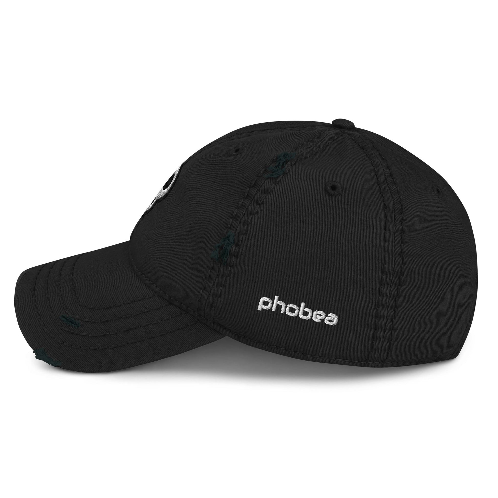 A hats_requiem cap from Phobea with a heart eye skull logo