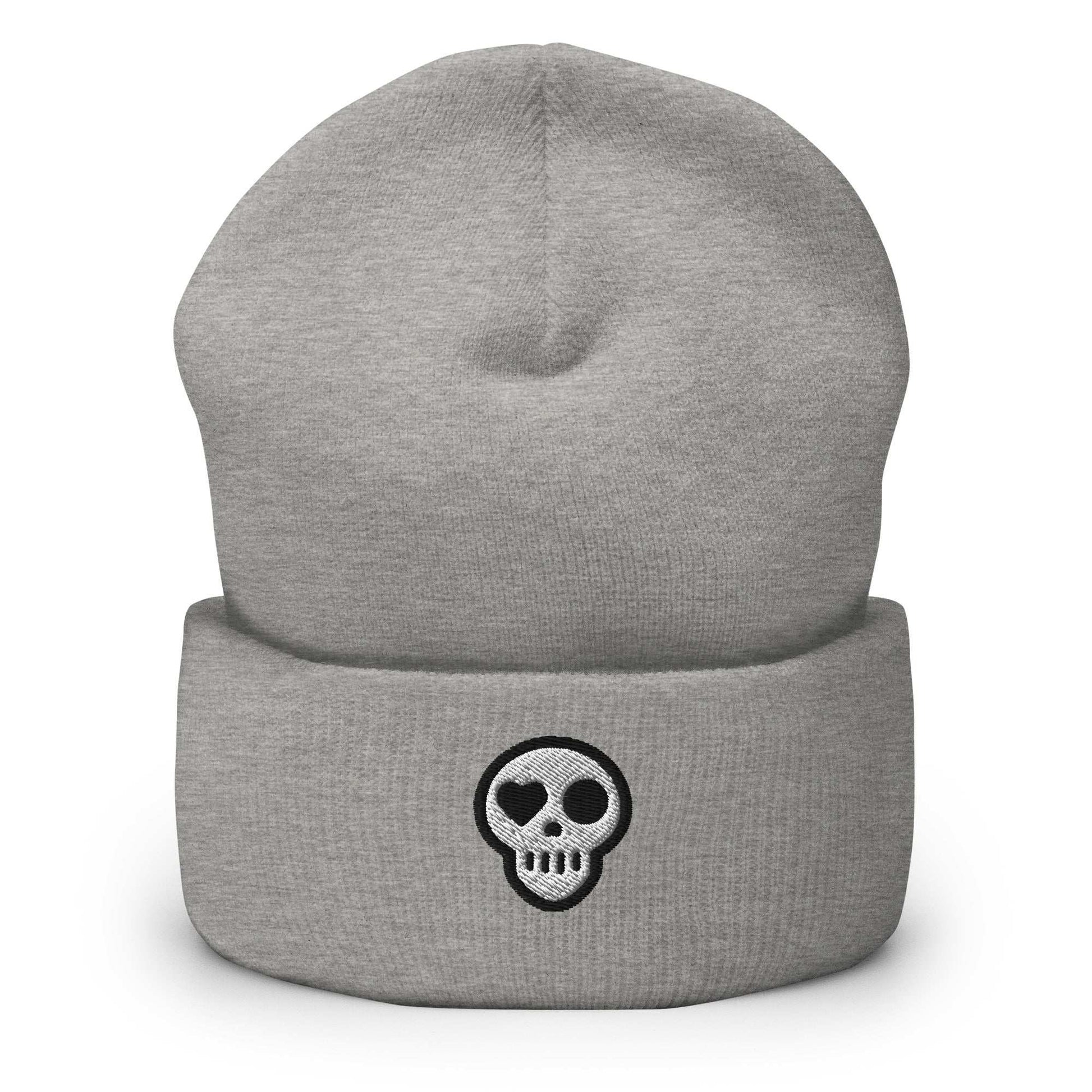 A Heather Grey Hats - Hearth Beanie from Phobea with a heart eye skull logo