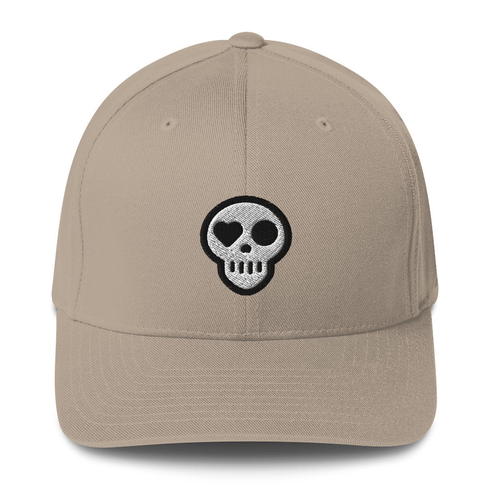 A Khaki / S/M hats_fitted eclipse cap from Phobea with a heart eye skull logo