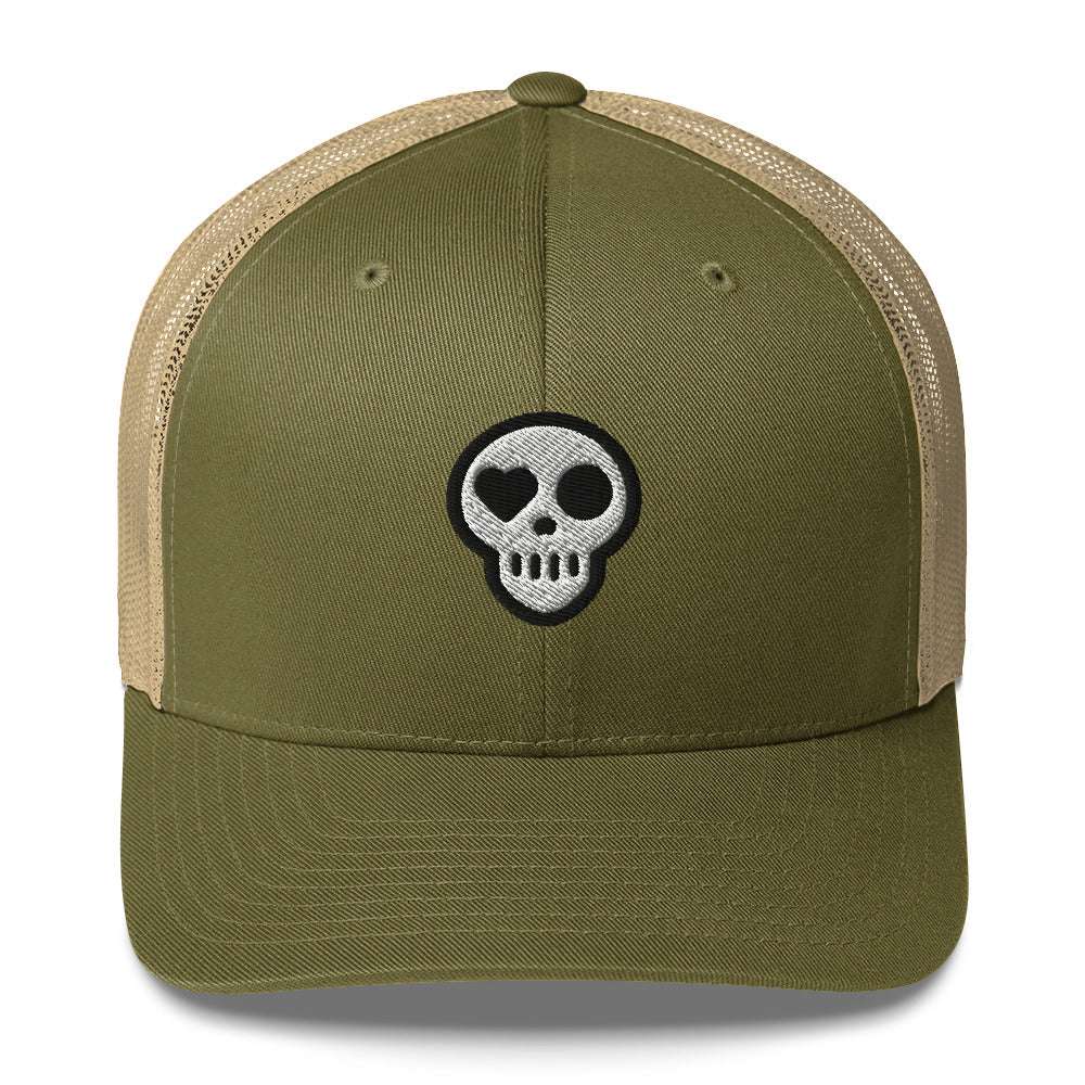 A Moss/ Khaki Hats - Nomad Trucker from Phobea with a heart eye skull logo