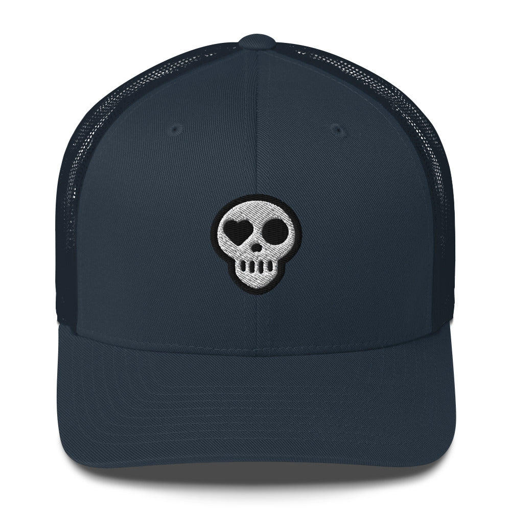 A Navy Hats - Nomad Trucker from Phobea with a heart eye skull logo