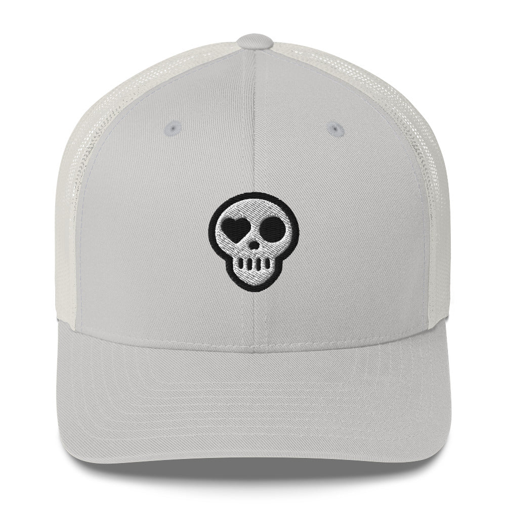 A Silver Hats - Nomad Trucker from Phobea with a heart eye skull logo