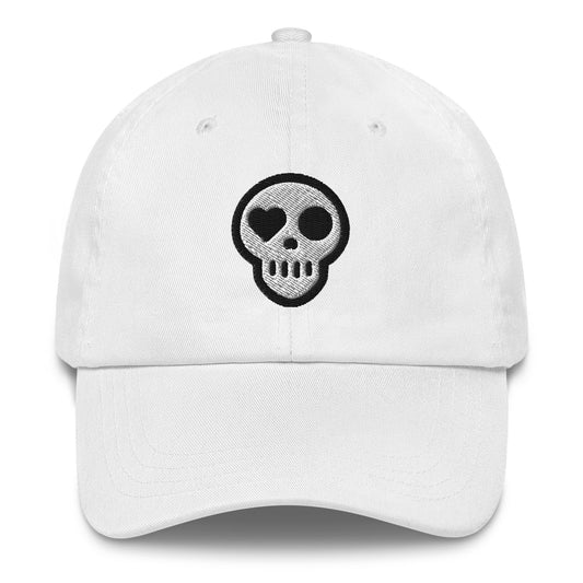 A White hats_legacy from Phobea with a heart eye skull logo