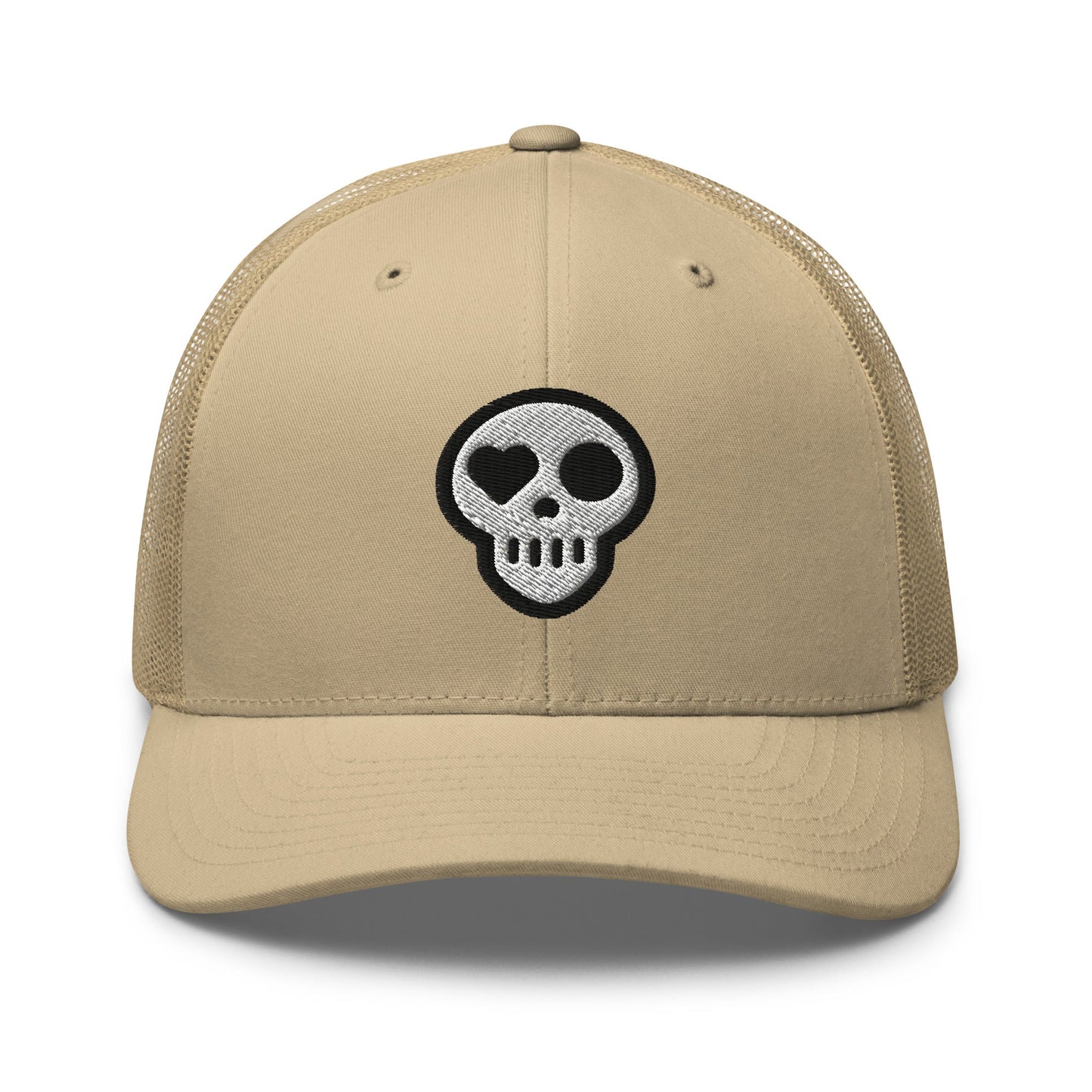 A Khaki hats_nomad trucker from Phobea with a heart eye skull logo